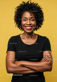 Confident African American Woman with Natural Afro Hair in Studio Portrait