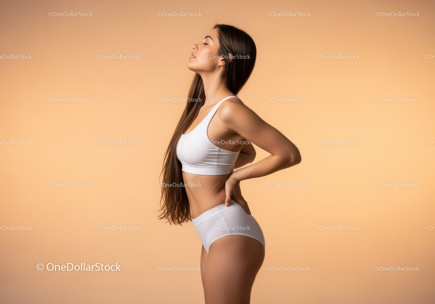 Slim Young Woman in White Sportswear Posing for Wellness and Fitness