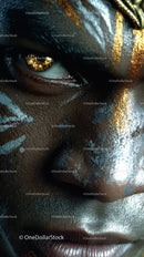 Close-up of An African Tribal Face with Gold Metallic Body Art