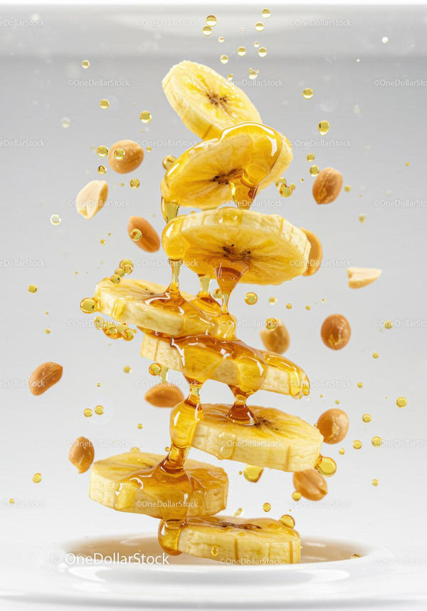 Banana slices dripping with golden honey and scattered nuts