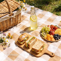 Fresh Picnic with Sandwiches and Fruit on a Sunny Day