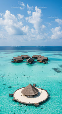 Overwater Bungalows on Turquoise Lagoon with White Sandy Beach