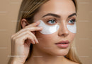 Beautiful Woman Applying Eye Patches for Skin Rejuvenation