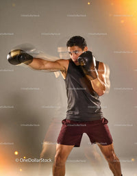 Boxer practicing fast punches with motion blur effect