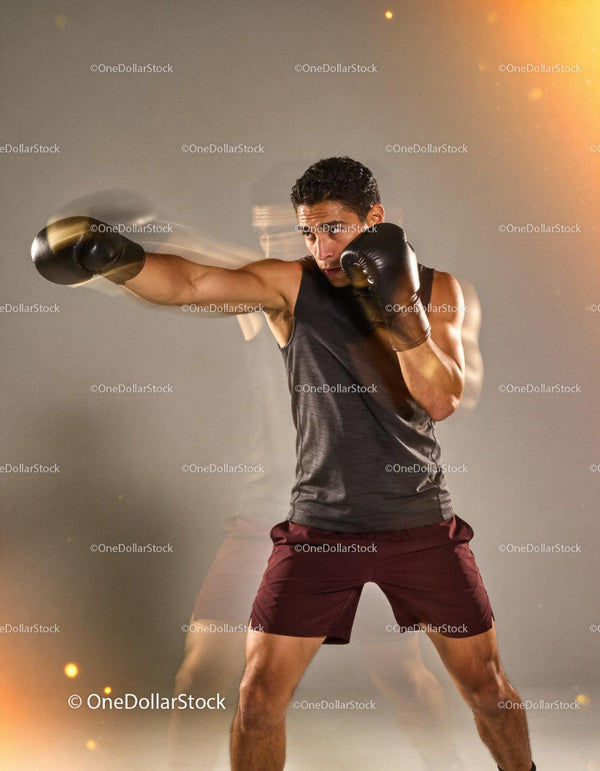 Boxer practicing fast punches with motion blur effect