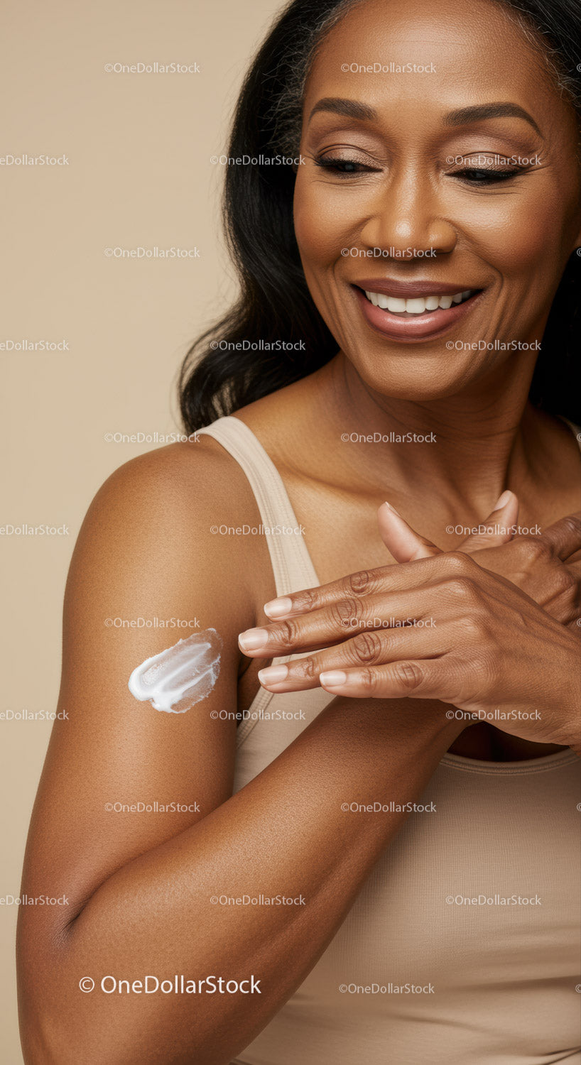 Smiling Woman Applying Sunscreen Serum for Healthy Skin
