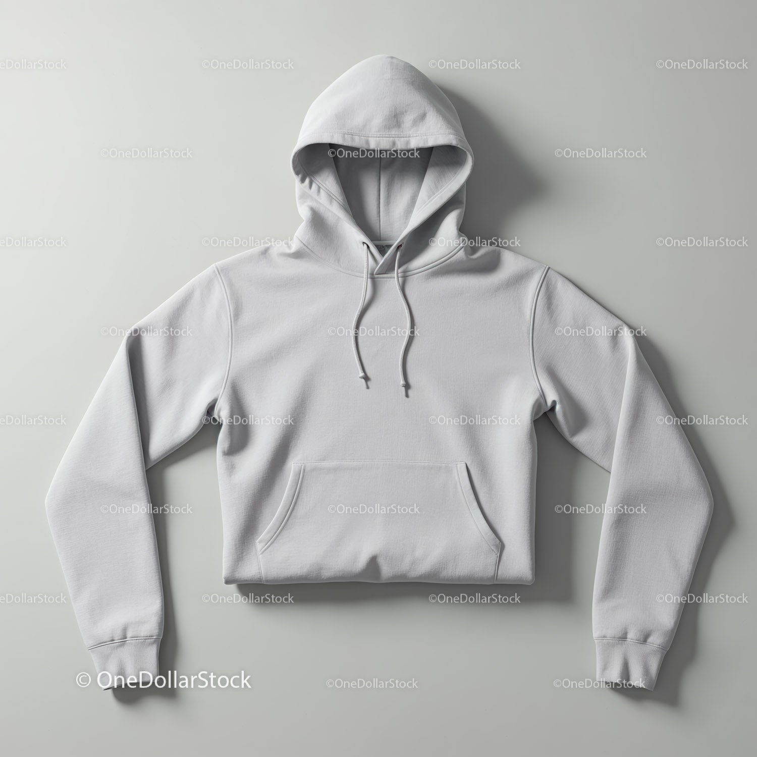Minimalist white hoodie laid flat on neutral background