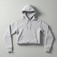 Minimalist white hoodie laid flat on neutral background
