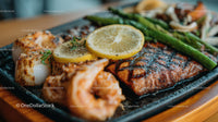 Grilled Salmon with Lemon Slices and Asparagus on Black Plate