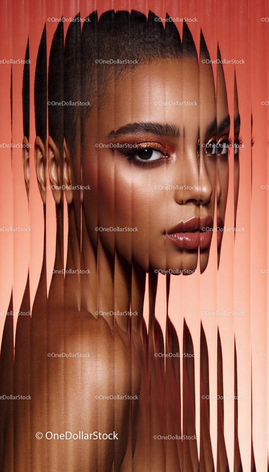Fragmented portrait of a woman with shimmering makeup