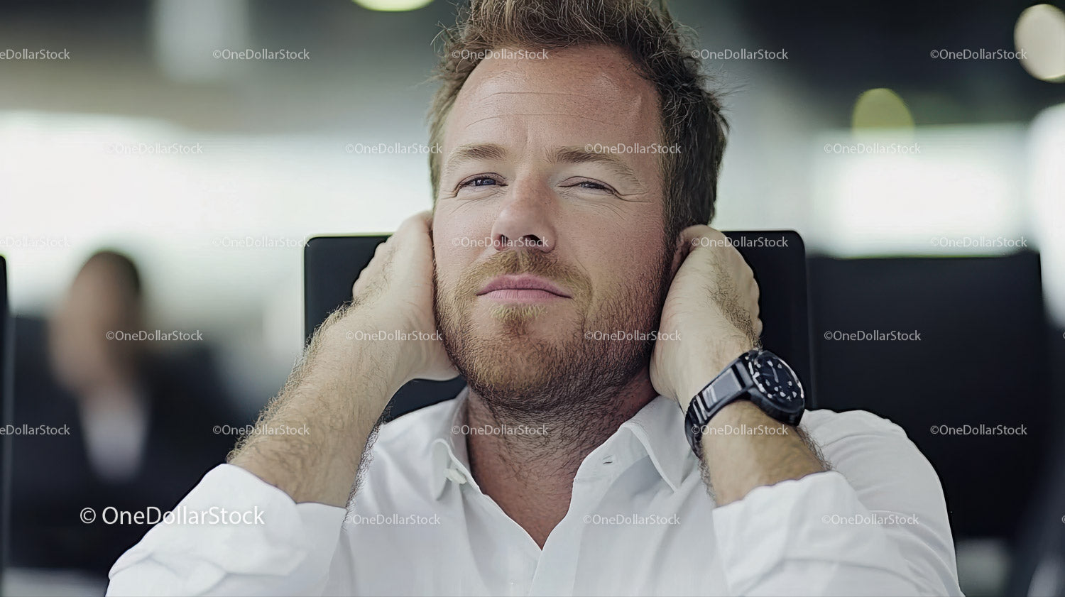 Confident Businessman Relaxing in Modern Office Setting