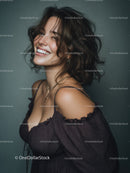Happy Woman with Wavy Hair Wearing Black Top in Studio