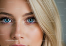 Close up of bright blue eyes and blonde hair