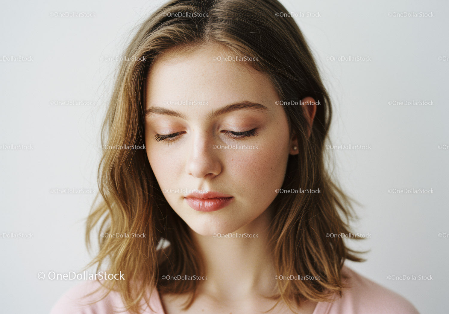 Young Woman with Soft Expression and Gentle Smile