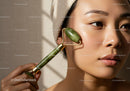 Close-up of a Woman Using Jade Roller for Facial Massage Beauty Treatment