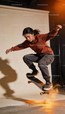 Young woman performing skateboard trick indoors