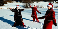 Young people celebrating winter in festive Santa hats