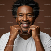 Happy Smiling Man with Cheerful Expression in Studio Portrait