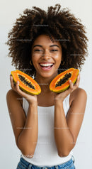 Young Woman with Fresh Papaya Slices Smiling Brightly