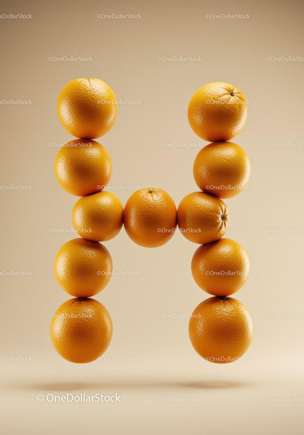 Letter H formed with fresh ripe oranges on beige background