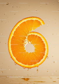 Fresh orange slice shaped like number six with droplets