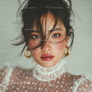 Fashion Portrait of a Young Woman with Curly Hair and Feminine Style