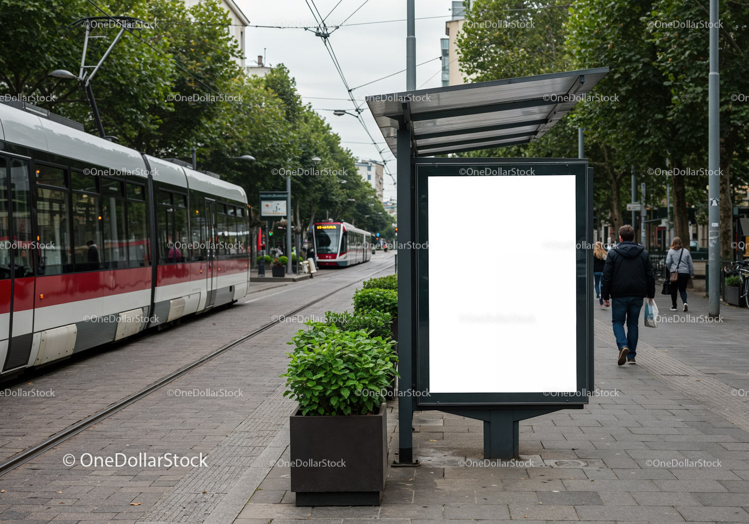 Modern urban tram stop with blank advertising board