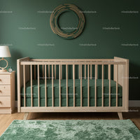 Modern Wooden Baby Crib with Green Mattress in Cozy Nursery