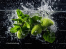 Fresh Green Basil Leaves Splashing in Water in a High-Res Image