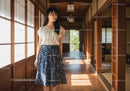 Young Woman in Navy Blue Botanical Dress in Traditional Japanese House