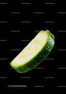 Fresh green zucchini slice with water droplets