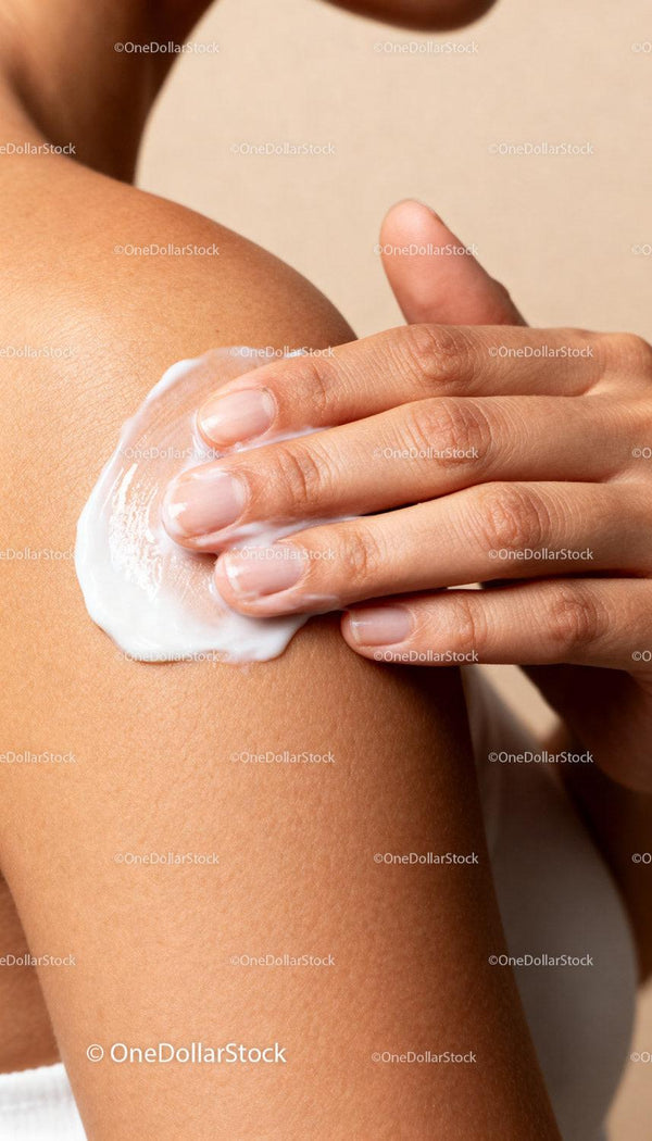 Applying Moisturizing Cream on Smooth Shoulder Skin