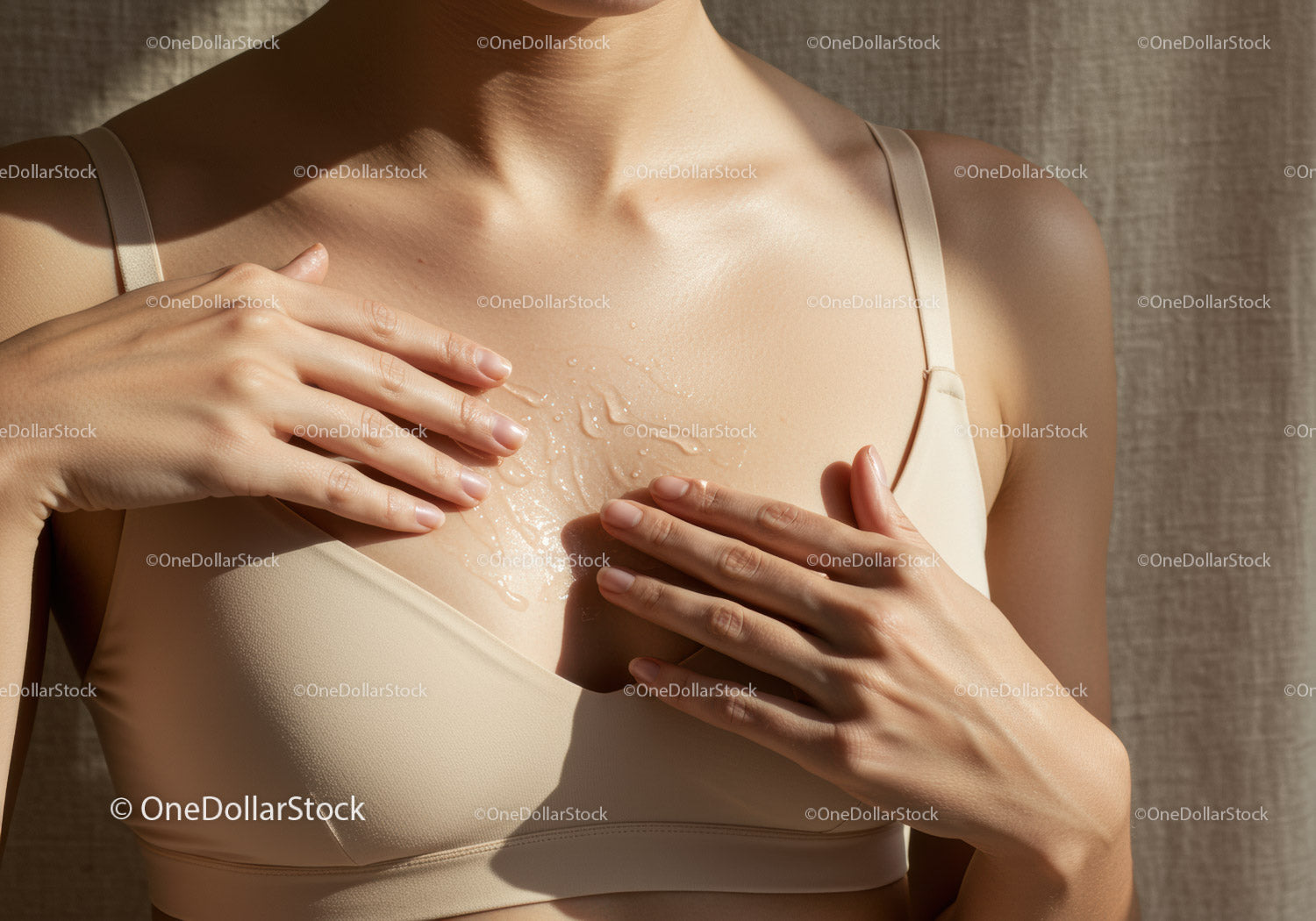Close-up of Woman Applying Moisturizer on Chest for Healthy Skin