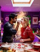 Couple Playfully Baking Heart Shaped Cookies at Home