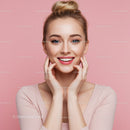 Beautiful Smiling Woman with Blue Eyes and Blonde Hair on Pink Background