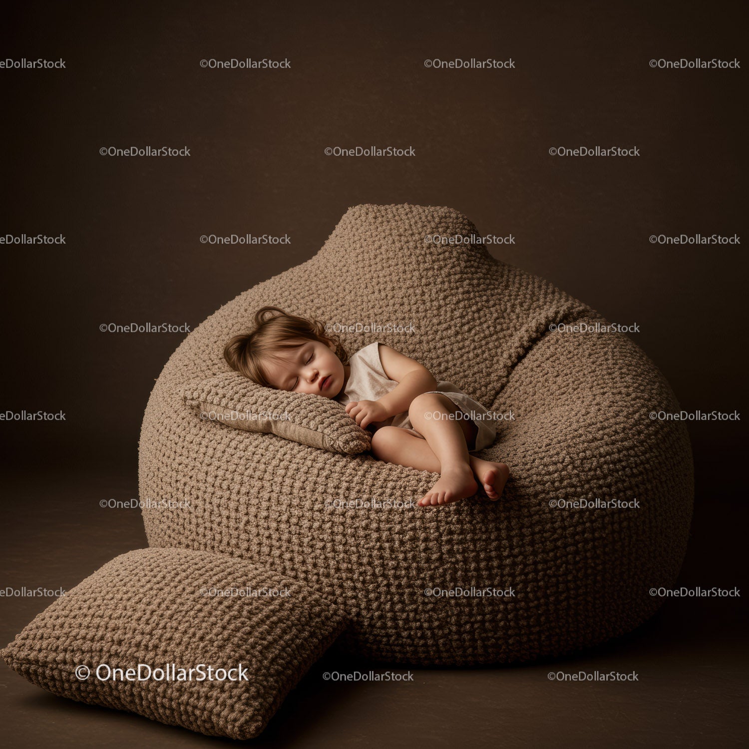 Peaceful toddler sleeping on chunky knit bean bag chair