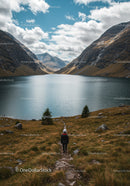 Majestic Mountain Lake Scene with Hiker and Rugged Landscape