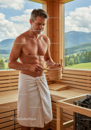 Muscular Man Enjoying Sauna in Modern Wooden Wellness Center