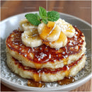 Delicious Banana Pancakes with Caramel and Mint Topping