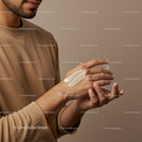 Man Applying Moisturizer on Hands for Healthy Skin