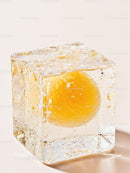 Fresh Egg Yolk Frozen Inside Transparent Ice Cube