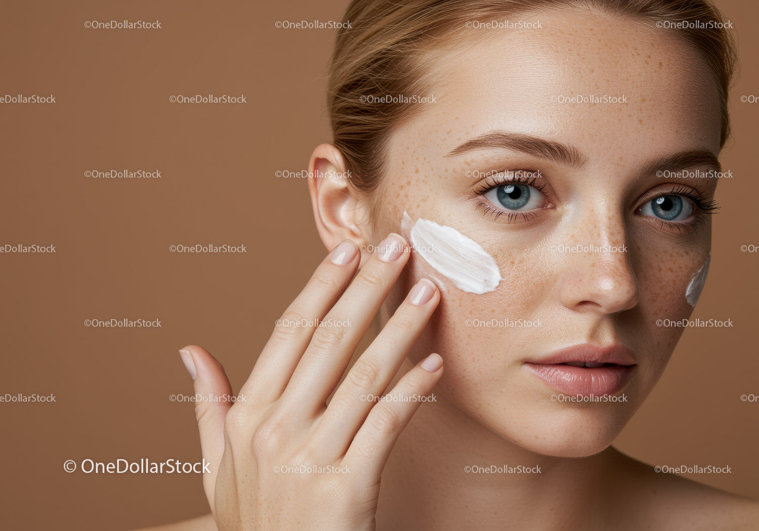 Young Woman Applying Facial Cream for Skin Rejuvenation