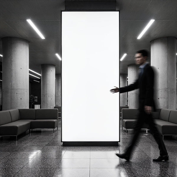 Blurred businessman walking past large blank urban billboard JPG Mockup Image