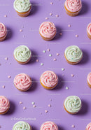 Colorful cupcakes with pastel frosting on purple background