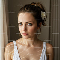 Young Woman with Blue Eyes and White Flower in Hair