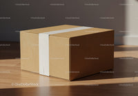 Brown cardboard box sealed with white tape on wooden floor