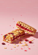 Berry filled granola bars with scattered cereal and drops
