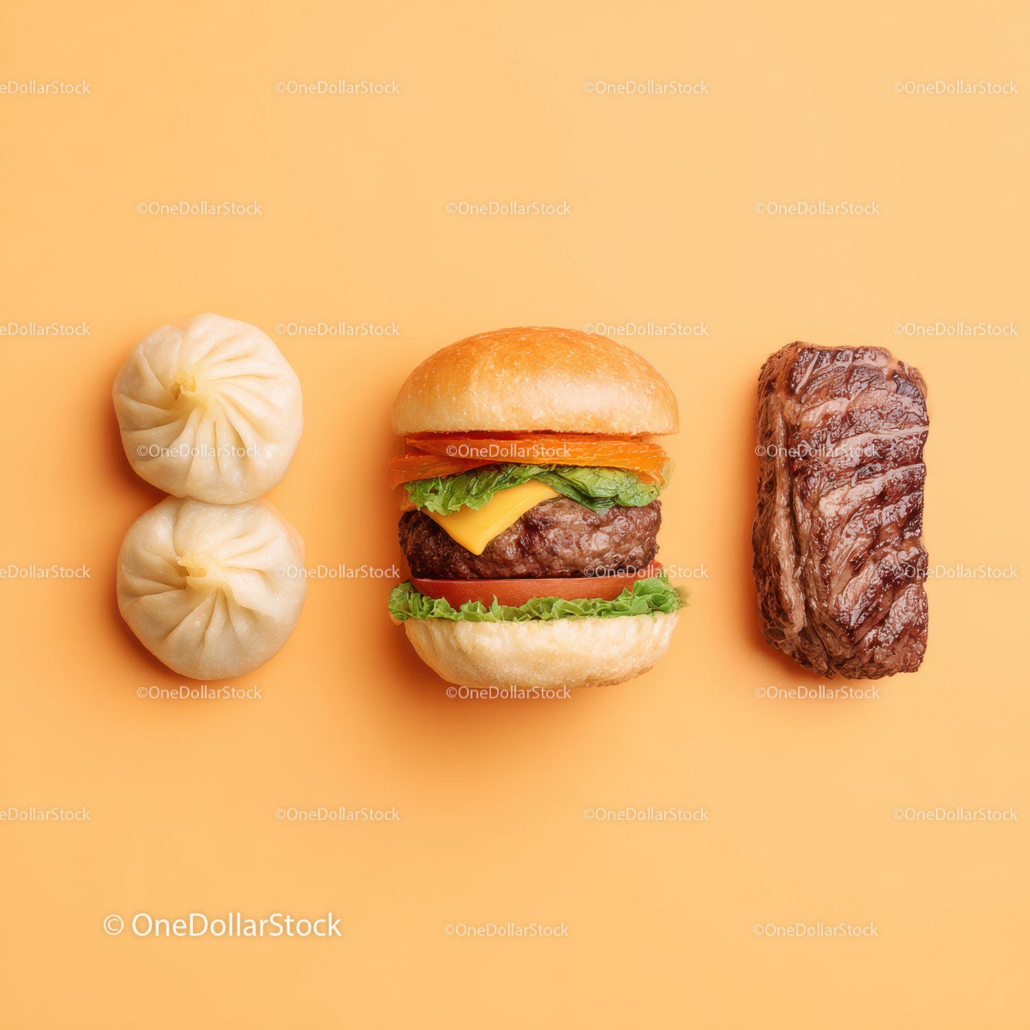 Gourmet Burger with Lettuce and Tomato Next to Grilled Steak and Dumpling