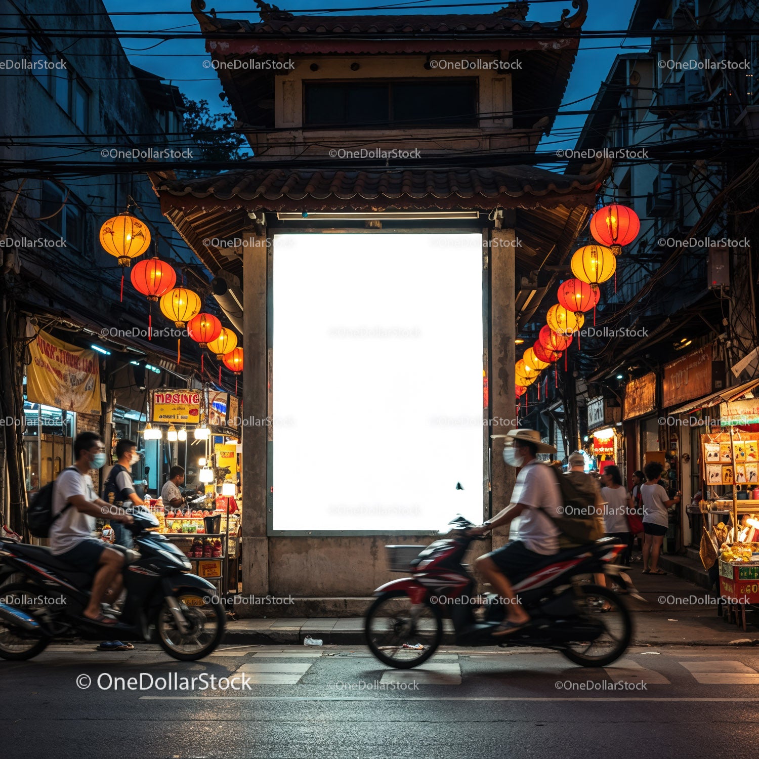 Evening street scene with motorbikes and lanterns
