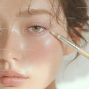 Close-up of Woman Applying Eyeshadow with Cosmetic Brush